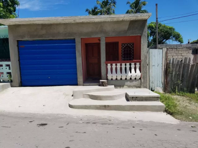 Foto en Casa de 2 cuartos, 2 baños y 1 garaje por $ 35.000