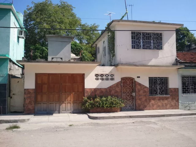 Foto en Casa de 1 cuarto, 2 baños y 1 garaje por $ 26.000