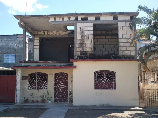 Foto en Casa de 2 cuartos, 1 baño y 1 garaje por $ 30.000